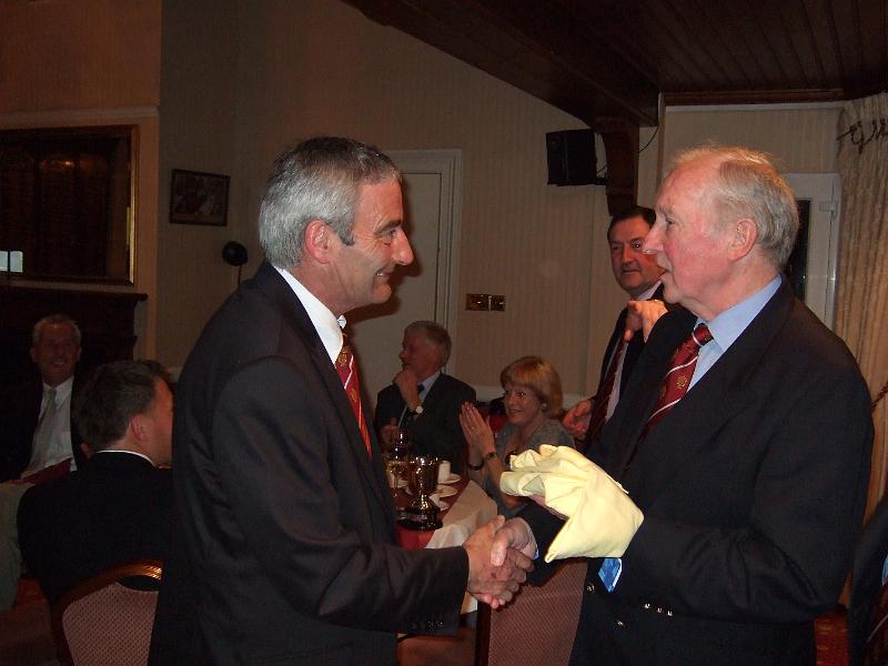 Club Photos 335.jpg - Murray Akehurst - Receiving his 'Nearest the Pin' Prize from President Roy